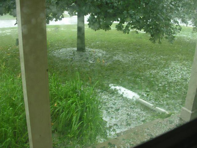 Downspout plugged with hail